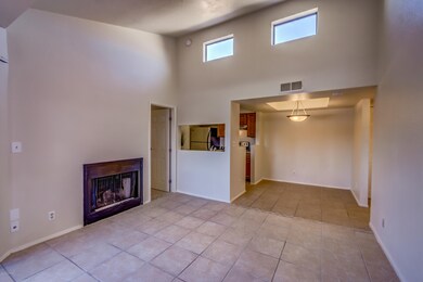 living room with kitchen opening