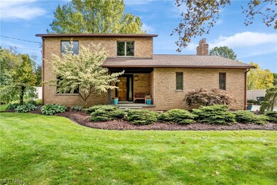 View of property featuring a front yard