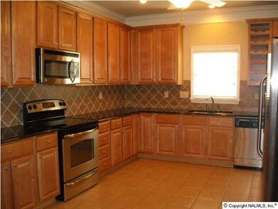 Gourmet Kitchen with Lots of Cabinets, Granite Countertops, Stainless Steel Appliances, Hardwood Floors