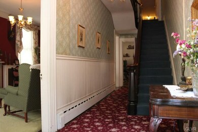 View of the 1st floor formal hall featuring a 1/2 