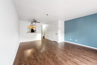 The downstairs features wood floors throughout and