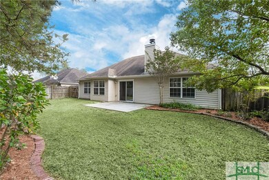 Beautiful backyard retreat with privacy fence and 