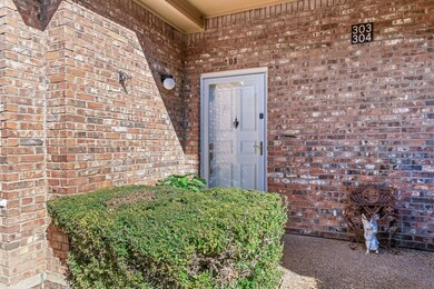 Foyer entrance featuring sink, light wood-type flo