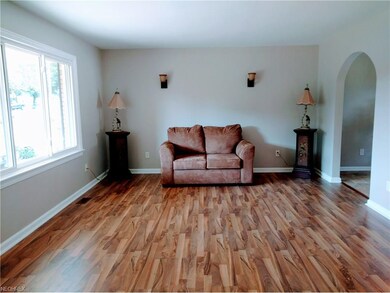 Living Room w/ new laminate flooring & new windows