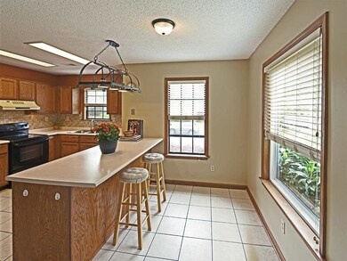 The breakfast space includes a built-in eating bar