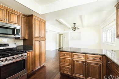 Handsome cabinetry, stainless steel range