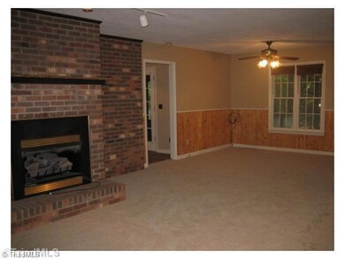 Den/Family/Great Room. Living Room/ Dining Room with Fireplace