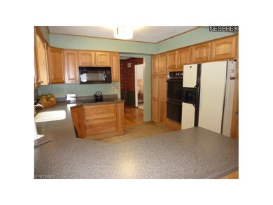 Beautifully Updated Kitchen, Corian Solid Surface Counters, An Abundance of Cabinets, Great Workspace ...