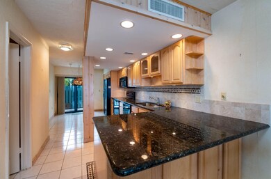 Large kitchen peninsula with storage
