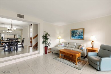 Living room adjacent to separate dining area