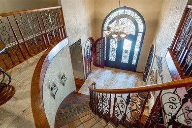 Gorgeous entry way & main stair case, second stair