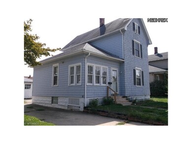 Glass Block windows, exterior paint and drive are 