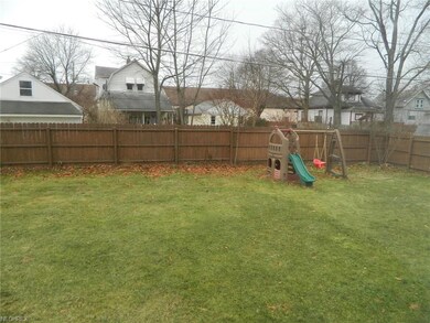 Fully fenced w/wood privacy fencing in rear yard &
