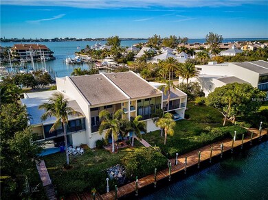 Aerial View of the back of the Condo & Canal Acces