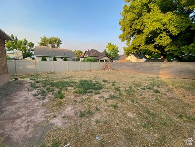 View of fenced backyard