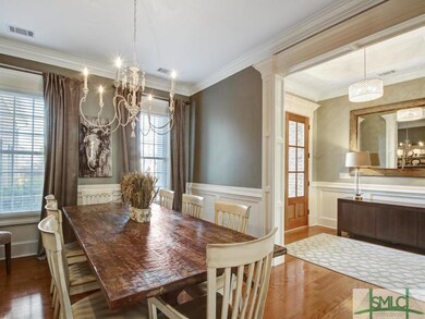 Beautifully designed formal dining room , plenty o