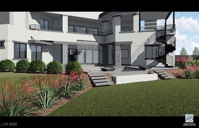 Rear view of house with a patio area and waterfall pool.