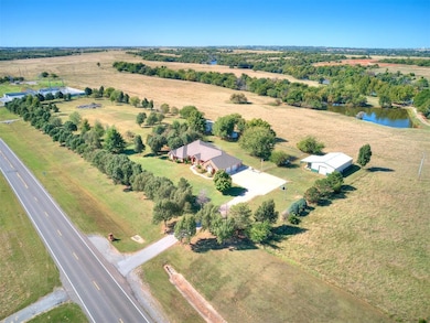 Drone / aerial view with a rural view and a water 