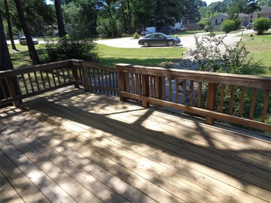 Large, shady front deck to enjoy your morning coffee.