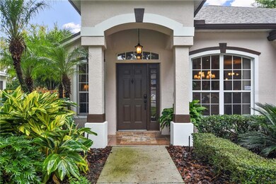 Open and welcoming front entry with inlayed tile d