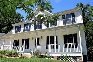 Imagine yourself enjoying this full country porch 