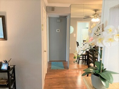 From living room to hallway leading to bedroom and