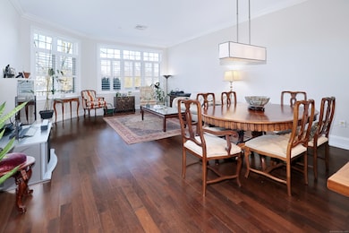Combination living room and dining area with floor