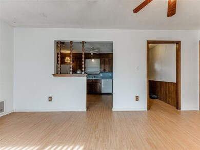 Unfurnished living room featuring light wood-type 
