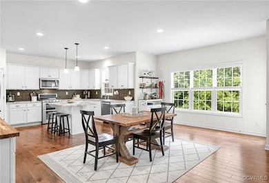 Open layout seamlessly connects the eat-in kitchen