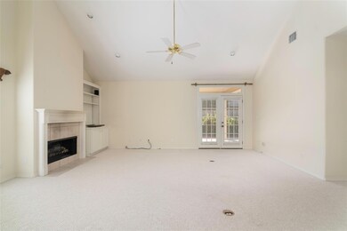 Spacious and gracious living room with vaulted cei