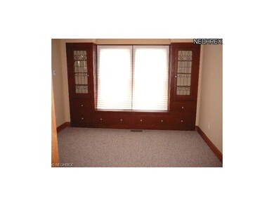 FORMAL DINNING ROOM WITH NEWER CARPETING