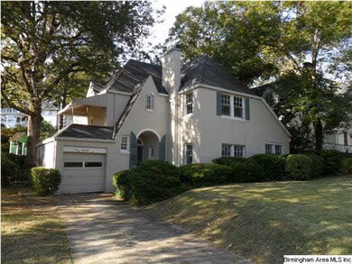 Front view #2 showing main level garage, rare for 