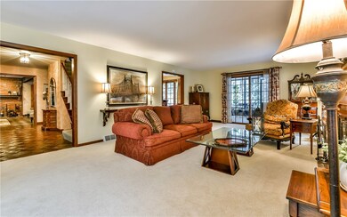 Light and bright living room with a cozy fireplace