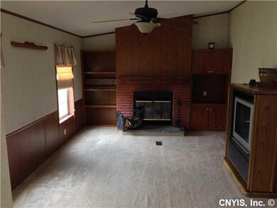 Family Room Spacious family room with wood burning