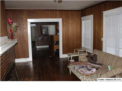 Living room, gas log fireplace on left