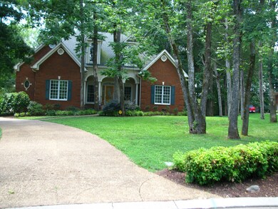 This home sits back off a mini cul-de-sac