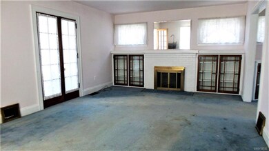 Formal Living room with wood burning fireplace NWT