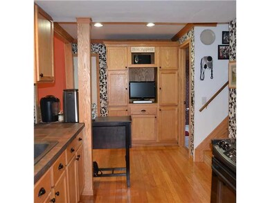 Kitchen. oak kitchen cabinets and flooring.   Cera
