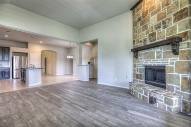This home is loaded with upgrades including wood flooring and a stone fireplace!