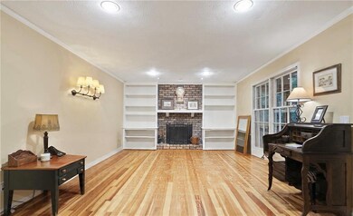 Family room virtual staging to remove additional furnishings