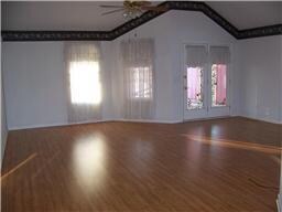 Very Large Living Room ( space for dining area) - Opens to glassed-in FL Room and to Kitchen with Dining Nook
