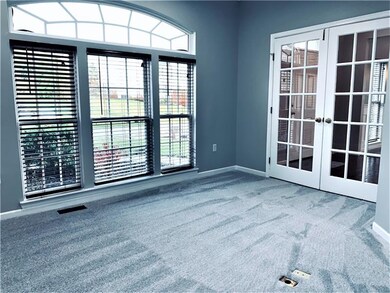 The 1st floor 14x13 office with tons of natural li
