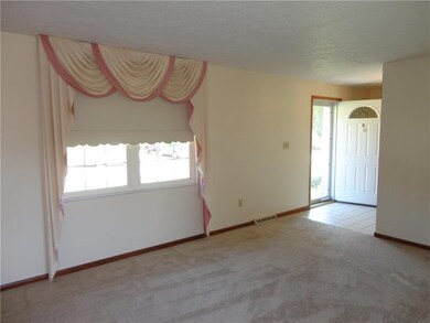 SPACIOUS 18X12 LIVING ROOM WITH NEWLY PAINTED WALL