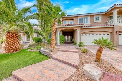 Mediterranean / spanish-style home featuring drive