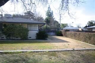 Other side has double gate to the rear yard!