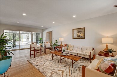 With huge sliding glass door to back yard, pool an