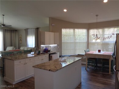Kitchen featuring tasteful backsplash, dark wood-t