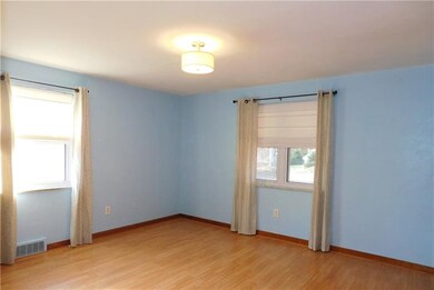 Master bedroom features tons of natural light, bea