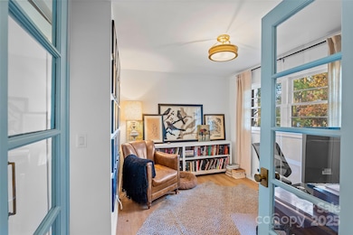 With French doors, enjoy privacy while still staying connected to the open living room, cozy fireplace, and delicious aromas from the kitchen.