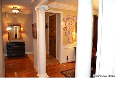 Elegant and warm entry with travertine flooring & 